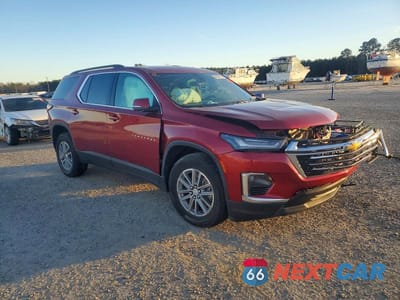Czwarte zdjęcie samochodu z boku: 2023 CHEVROLET TRAVERSE LT VIN:1GNERGKW9PJ128545 - miniatura