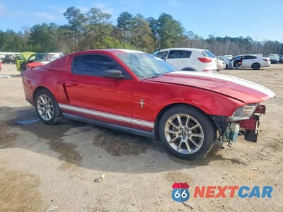Czwarte zdjęcie samochodu z boku: 2010 FORD MUSTANG VIN:1ZVBP8AN2A5118971 - miniatura