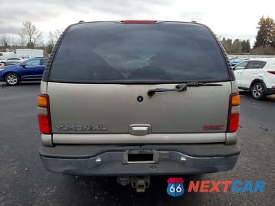 Zdjęcie 6 z 11 samochodu: 2000 GMC YUKON XL K1500 VIN:3GKFK16T1YG139965 - miniatura