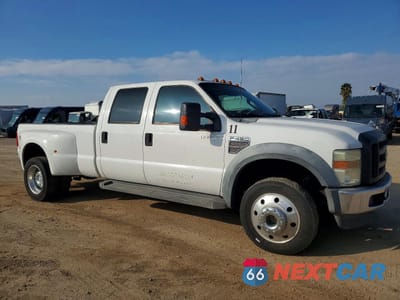 Czwarte zdjęcie samochodu z boku: 2010 FORD F450 SUPER DUTY VIN:1FTXW4DR6AEA36440 - miniatura