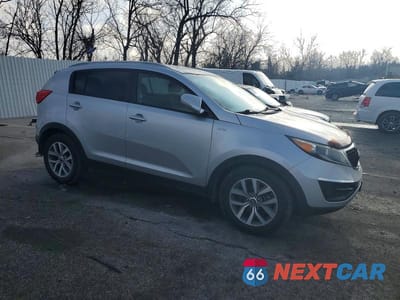 Czwarte zdjęcie samochodu z boku: 2015 KIA SPORTAGE LX VIN:KNDPBCAC4F7780023 - miniatura