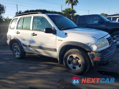 Czwarte zdjęcie samochodu z boku: 2004 SUZUKI VITARA LX VIN:2S3TD62V046100952 - miniatura
