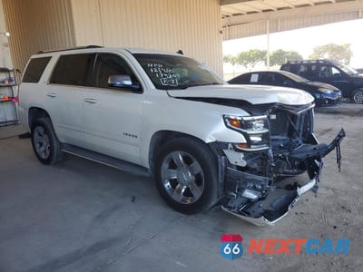 Czwarte zdjęcie samochodu z boku: 2015 CHEVROLET TAHOE K1500 LTZ VIN:1GNSKCKC5FR179207 - miniatura