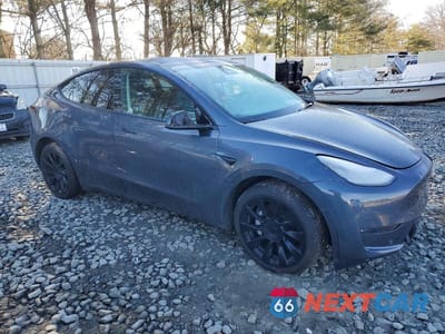 Czwarte zdjęcie samochodu z boku: 2023 TESLA MODEL Y VIN:7SAYGDEE6PA057888 - miniatura