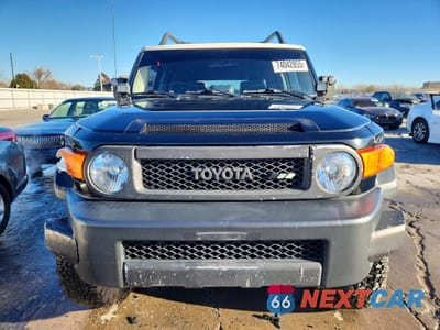 Piąte zdjęcie samochodu w środku: 2012 TOYOTA FJ CRUISER VIN:JTEBU4BF9CK139103 - miniatura