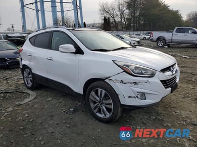 Czwarte zdjęcie samochodu z boku: 2014 HYUNDAI TUCSON GLS VIN:KM8JUCAG7EU832257 - miniatura