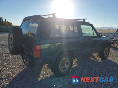 Trzecie zdjęcie samochodu z tyłu: 1996 JEEP CHEROKEE SPORT VIN:1J4FJ67S4TL309856 - miniatura