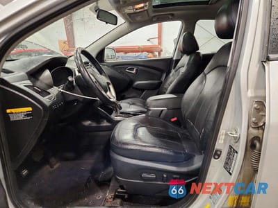 Zdjęcie 7 z 12 samochodu: 2010 HYUNDAI TUCSON VIN:KM8JUCAC8AU047186 - miniatura