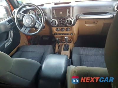 Zdjęcie 8 z 12 samochodu: 2011 JEEP WRANGLER UNLIMITED SAHARA VIN:1J4HA5H1XBL572649 - miniatura