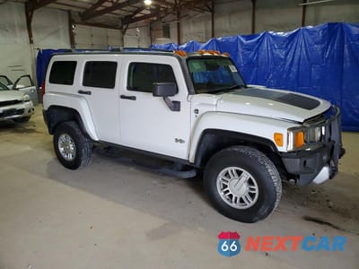Czwarte zdjęcie samochodu z boku: 2009 HUMMER H3 VIN:5GTEN13E398110701 - miniatura