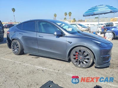 Czwarte zdjęcie samochodu z boku: 2022 TESLA MODEL Y VIN:7SAYGDEF2NF350499 - miniatura