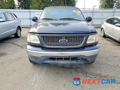 Piąte zdjęcie samochodu w środku: 2001 FORD F150 SUPERCREW VIN:1FTRW07LX1KC32150 - miniatura