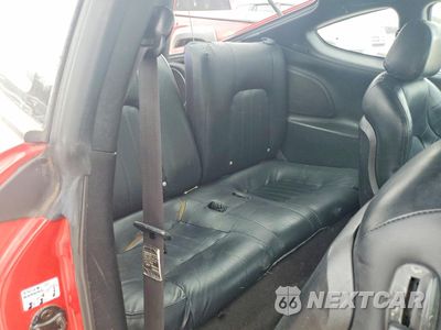 Zdjęcie 10 z 15 samochodu: 2003 HYUNDAI TIBURON GT VIN:KMHHN65F93U092142 - miniatura