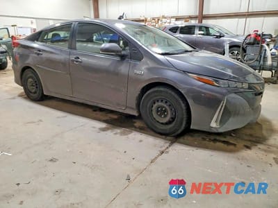 Czwarte zdjęcie samochodu z boku: 2021 TOYOTA PRIUS PRIME LE VIN:JTDKAMFP2M3186811 - miniatura