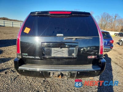 Zdjęcie 6 z 12 samochodu: 2011 GMC YUKON XL DENALI VIN:1GKS2MEF2BR286590 - miniatura