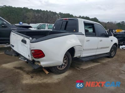 Trzecie zdjęcie samochodu z tyłu: 2001 FORD F150 SUPERCREW VIN:1FTRW07LX1KC30687 - miniatura