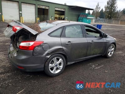 Trzecie zdjęcie samochodu z tyłu: 2014 FORD FOCUS SE VIN:1FADP3F22EL322903 - miniatura