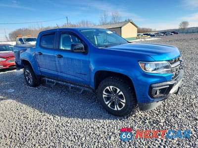 Czwarte zdjęcie samochodu z boku: 2022 CHEVROLET COLORADO Z71 VIN:1GCGTDENXN1273742 - miniatura