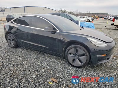 Czwarte zdjęcie samochodu z boku: 2019 TESLA MODEL 3 VIN:5YJ3E1EA5KF312082 - miniatura