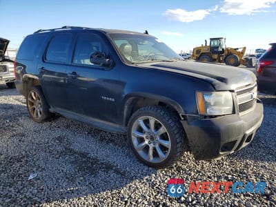 Czwarte zdjęcie samochodu z boku: 2010 CHEVROLET TAHOE K1500 LT VIN:1GNUKBE05AR218312 - miniatura