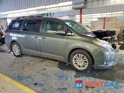 Czwarte zdjęcie samochodu z boku: 2014 TOYOTA SIENNA XLE VIN:5TDYK3DC1ES433088 - miniatura