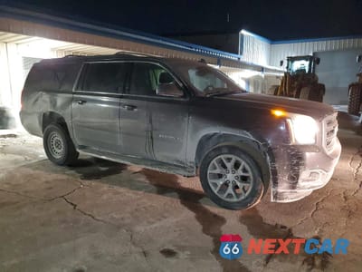 Czwarte zdjęcie samochodu z boku: 2015 GMC YUKON XL C1500 SLT VIN:1GKS1HKC7FR565253 - miniatura