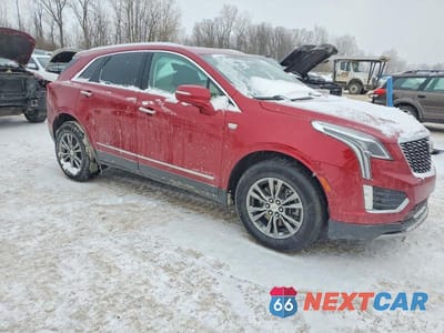 Czwarte zdjęcie samochodu z boku: 2021 CADILLAC XT5 PREMIUM LUXURY VIN:1GYKNCRSXMZ160110 - miniatura