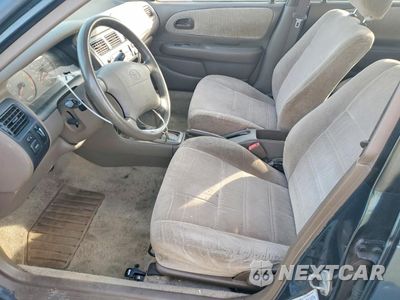 Zdjęcie 7 z 13 samochodu: 1997 TOYOTA COROLLA DX VIN:1NXBB02E0VZ558387 - miniatura