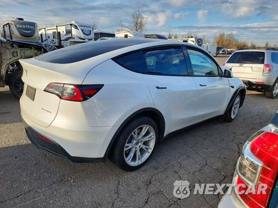 Trzecie zdjęcie samochodu z tyłu: 2023 TESLA MODEL Y VIN:7SAYGDEE5PF854863 - miniatura