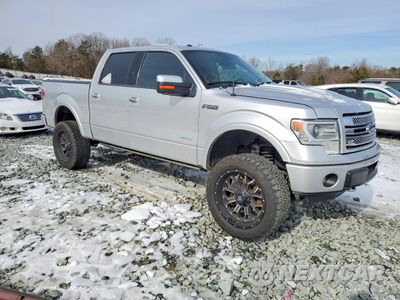 Czwarte zdjęcie samochodu z boku: 2014 FORD F150 SUPERCREW VIN:1FTFW1ET0EFB81056 - miniatura