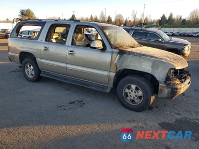 Czwarte zdjęcie samochodu z boku: 2002 CHEVROLET SUBURBAN K1500 VIN:1GNFK16Z42J239345 - miniatura