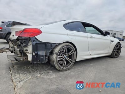 Trzecie zdjęcie samochodu z tyłu: 2013 BMW M6 VIN:WBSLX9C51DC968660 - miniatura