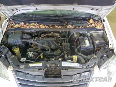 Zdjęcie 12 z 12 samochodu: 2010 CHRYSLER TOWN & COUNTRY LX VIN:2A4RR2D18AR398524 - miniatura
