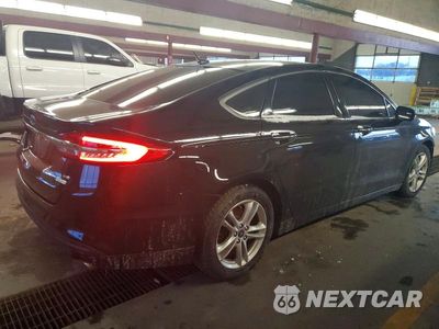 Trzecie zdjęcie samochodu z tyłu: 2018 FORD FUSION SE VIN:3FA6P0HD1JR135332 - miniatura