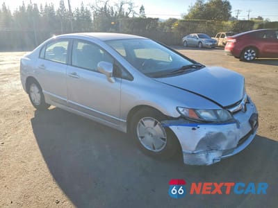 Czwarte zdjęcie samochodu z boku: 2007 HONDA CIVIC HYBRID VIN:JHMFA36287S001105 - miniatura