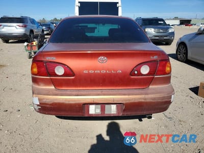 Zdjęcie 6 z 12 samochodu: 2001 TOYOTA COROLLA LE VIN:1NXBR12E31Z439857 - miniatura