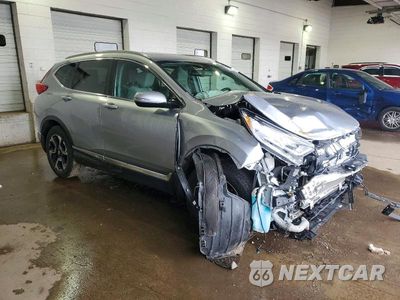 Czwarte zdjęcie samochodu z boku: 2017 HONDA CR-V TOURING VIN:2HKRW2H99HH663960 - miniatura