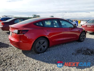 Trzecie zdjęcie samochodu z tyłu: 2022 TESLA MODEL 3 VIN:5YJ3E1EA3NF235829 - miniatura