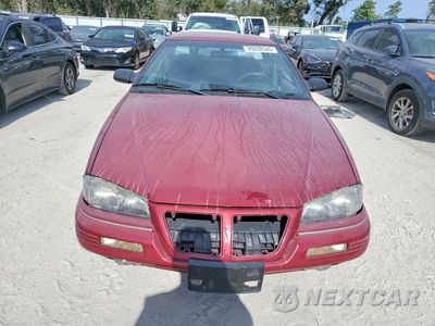 Piąte zdjęcie samochodu w środku: 1993 PONTIAC GRAND AM SE VIN:1G2NE1439PM602615 - miniatura