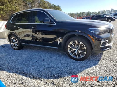Czwarte zdjęcie samochodu z boku: 2021 BMW X5 XDRIVE45E VIN:5UXTA6C08M9F27716 - miniatura