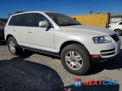 Czwarte zdjęcie samochodu z boku: 2004 VOLKSWAGEN TOUAREG 4.2 VIN:WVGCM77L84D040508 - miniatura