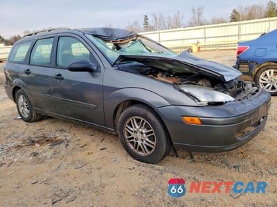 Czwarte zdjęcie samochodu z boku: 2002 FORD FOCUS SE VIN:1FAFP36342W286871 - miniatura