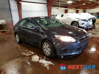 Czwarte zdjęcie samochodu z boku: 2012 FORD FOCUS SE VIN:1FAHP3F2XCL335347 - miniatura