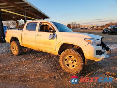 Czwarte zdjęcie samochodu z boku: 2023 TOYOTA TACOMA VIN:3TMCZ5AN4PM628550 - miniatura