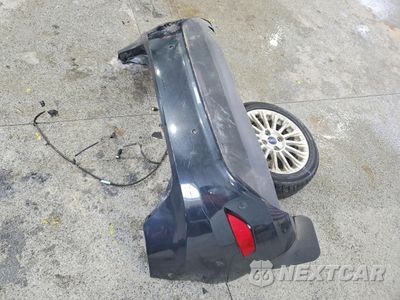 Zdjęcie 12 z 14 samochodu: 2014 FORD FIESTA TITANIUM VIN:3FADP4FJ4EM163085 - miniatura
