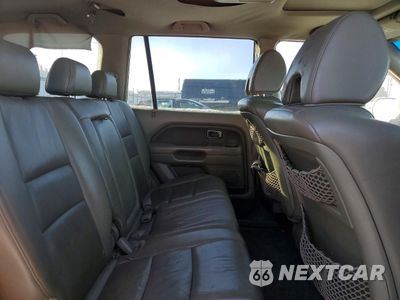 Zdjęcie 10 z 12 samochodu: 2006 HONDA PILOT EX VIN:2HKYF18686H541566 - miniatura