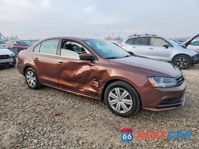 Czwarte zdjęcie samochodu z boku: 2017 VOLKSWAGEN JETTA S VIN:3VW167AJ6HM371849 - miniatura