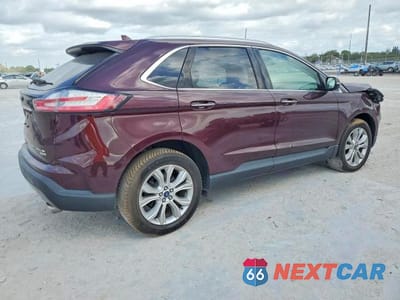 Trzecie zdjęcie samochodu z tyłu: 2019 FORD EDGE TITANIUM VIN:2FMPK3K90KBC15770 - miniatura