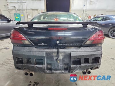 Zdjęcie 6 z 13 samochodu: 2004 PONTIAC GRAND AM GT VIN:1G2NW12E74C155625 - miniatura