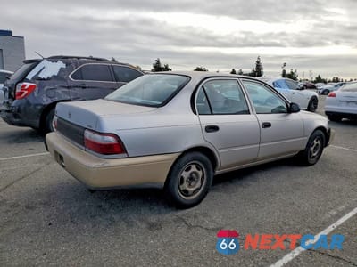 Trzecie zdjęcie samochodu z tyłu: 1997 TOYOTA COROLLA BASE VIN:1NXBA02E1VZ649994 - miniatura